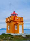 Iceland. Lighthouse Osholar, Bolungarvik at fjord Isafjardardjup during autumn. Art Print